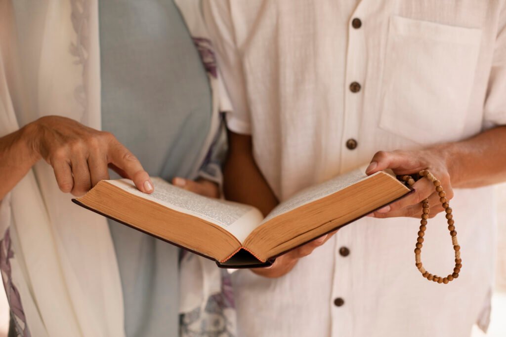 front view people praying together Methods for learning the Quran online for adults